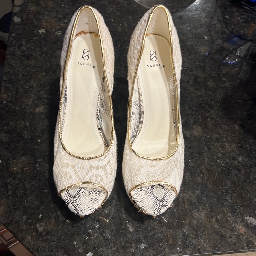 4’ high heels. Worn two times.